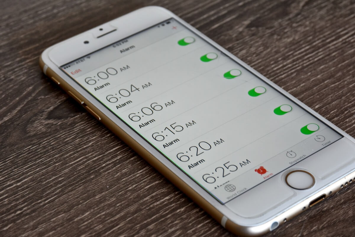 how to lower sound of alarm on iphone